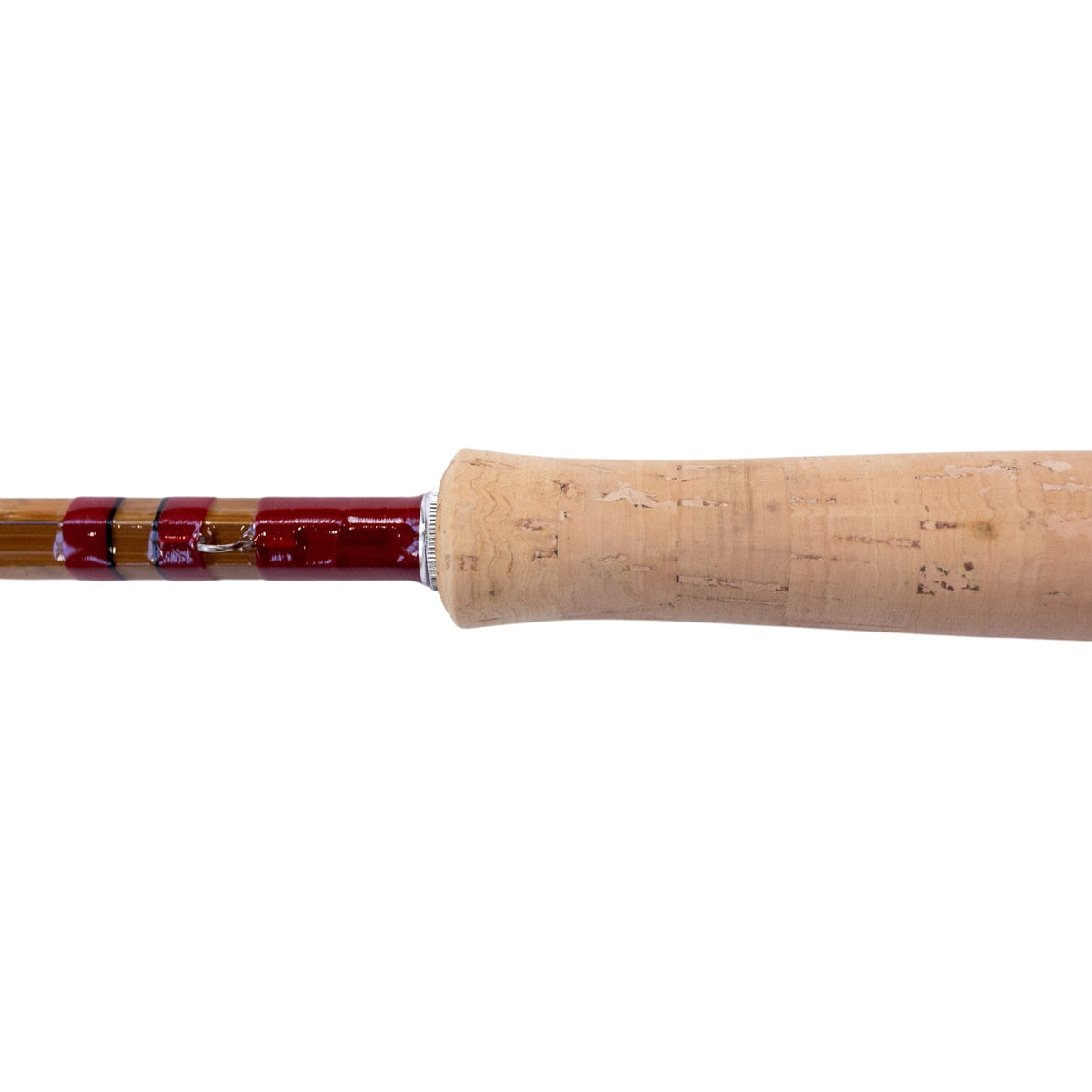 Hand-wrapped cork grip and red silk wraps on a Headwaters bamboo fly rod