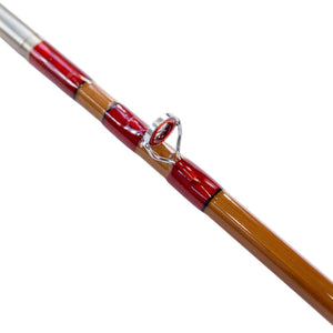 Snake guide and nickel silver ferrule on a bamboo fly rod blank