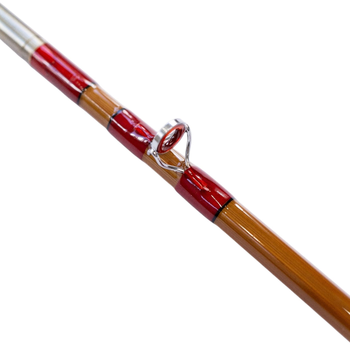 Snake guide and nickel silver ferrule on a bamboo fly rod blank