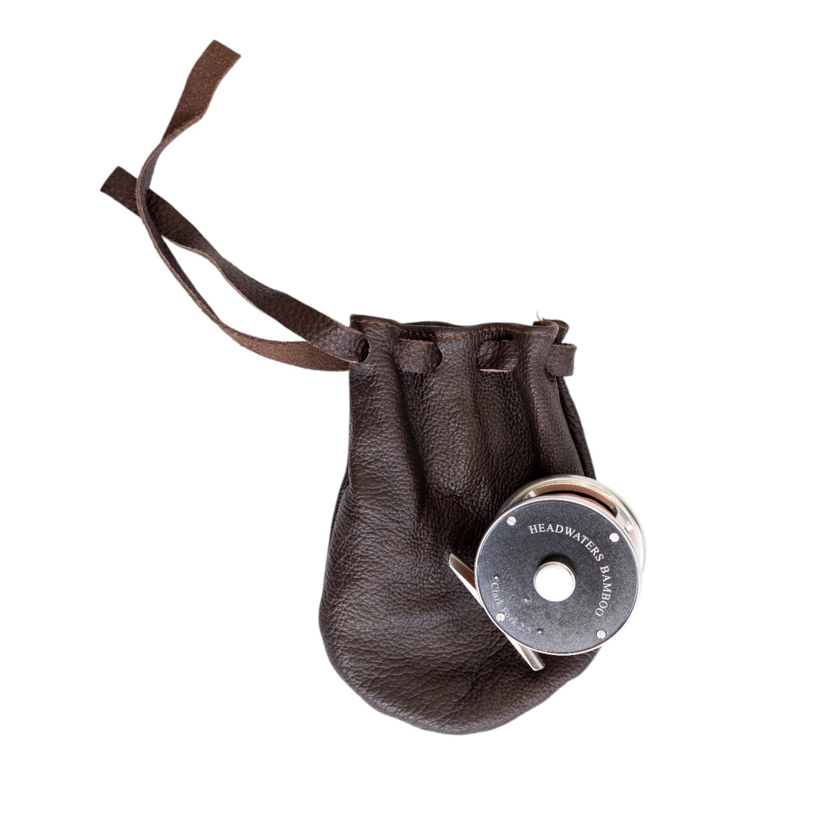 Clark Fork fly reel with its leather drawstring pouch