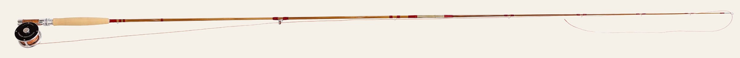 A complete two-piece Headwaters bamboo fly rod with its Clark Fork reel hanging below the cork grip